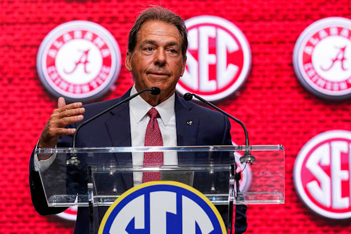 Alabama head coach Nick Saban speaks on the stage during the SEC Media Days at the College Football Hall of Fame.